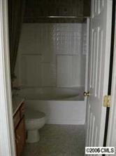 3517 Summerfield Ridge Lane Matthews, NC 28105 - Photo 8 of 8 a bathroom with a shower and toilet