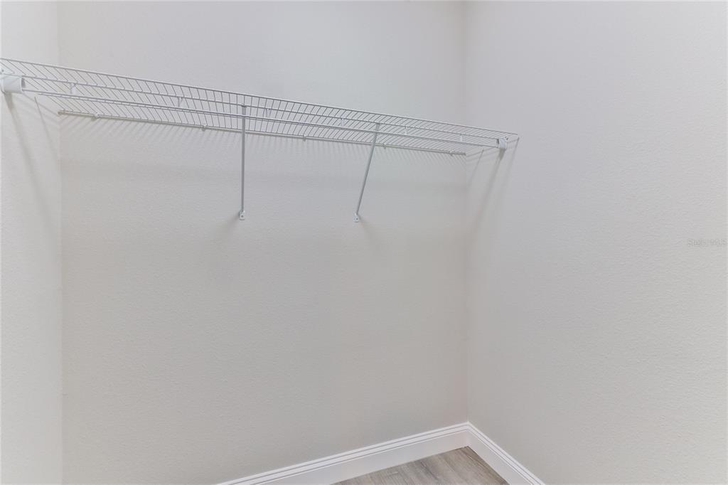 9 Seton Place, Unit A Palm Coast, FL 32164 - Photo 20 of 31 a view of a room with racks on the wall