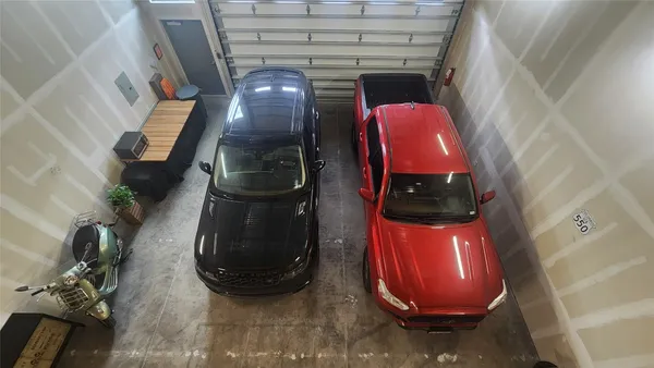 a bathroom with a sink toilet and mirror