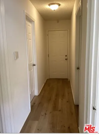 a view of room with window and ceiling fan