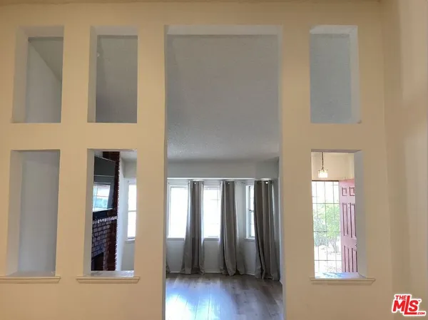 a kitchen with a sink and a window