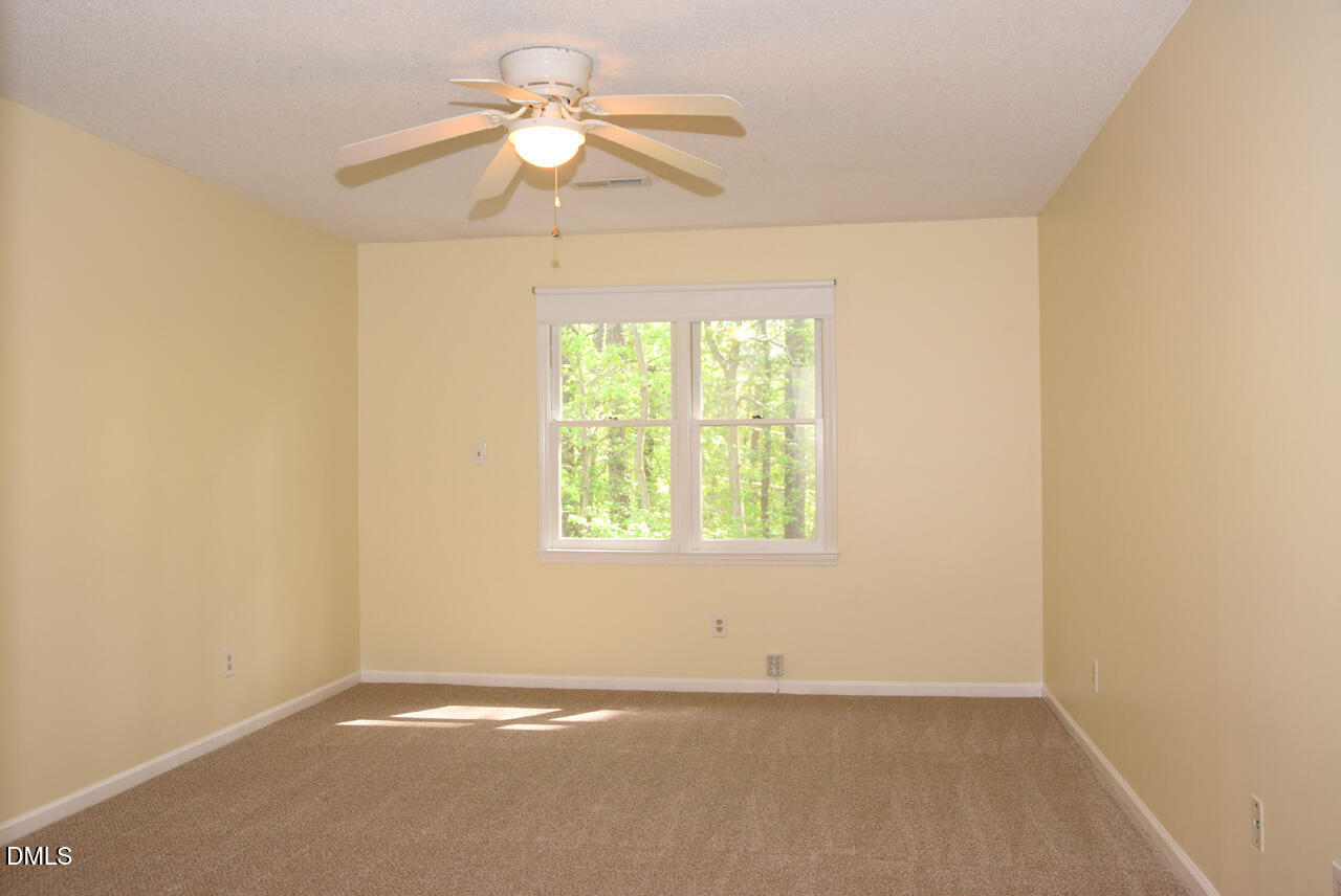 1015 Oak Lake Court Raleigh, NC 27606 - Photo 17 of 37 Primary Suite 1