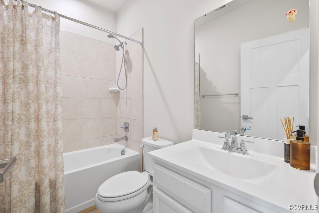 2117 Borough Ridge Street Richmond, VA 23225 - Photo 16 of 27 Bathroom featuring toilet, shower / bath combo, vi