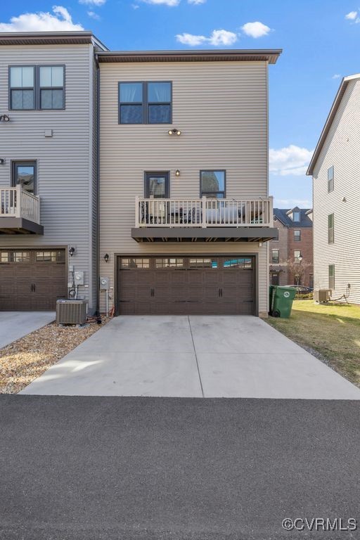 2117 Borough Ridge Street Richmond, VA 23225 - Photo 21 of 27 View of front of property with a garage, central A