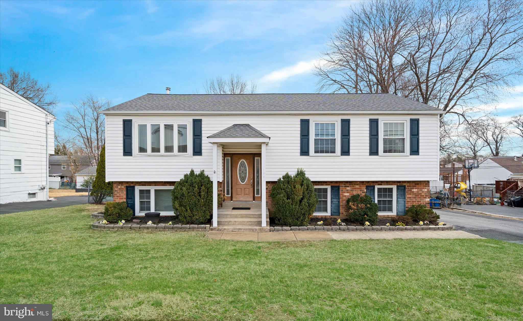 1331 Cherry Tree Road Aston, PA 19014 - Photo 1 of 40 a front view of a house with a yard