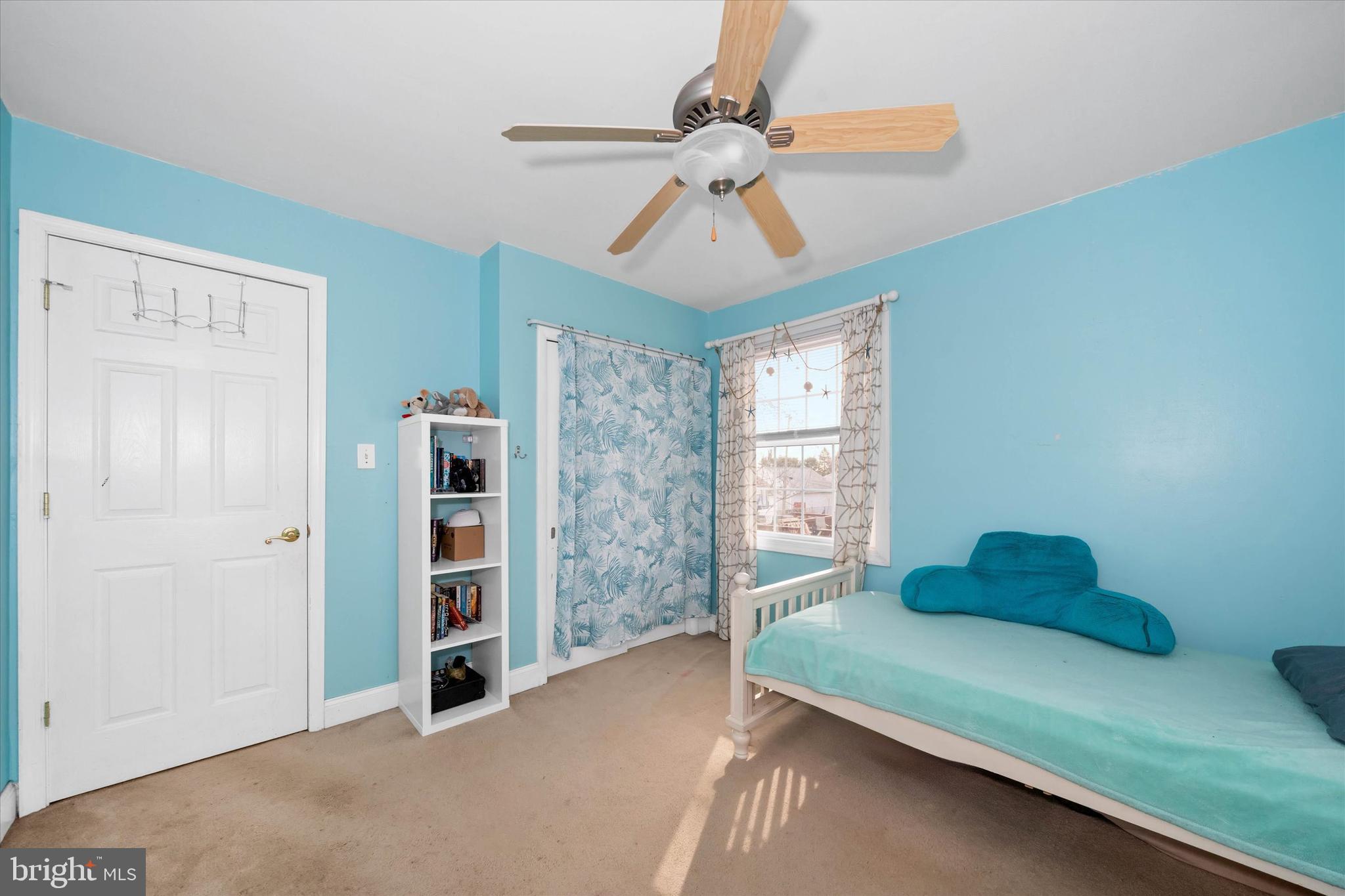 1331 Cherry Tree Road Aston, PA 19014 - Photo 17 of 40 a bedroom with a bed and a chandelier