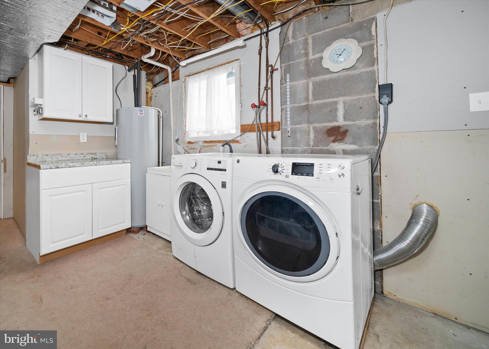 1331 Cherry Tree Road Aston, PA 19014 - Photo 31 of 40 a utility room with dryer and washer