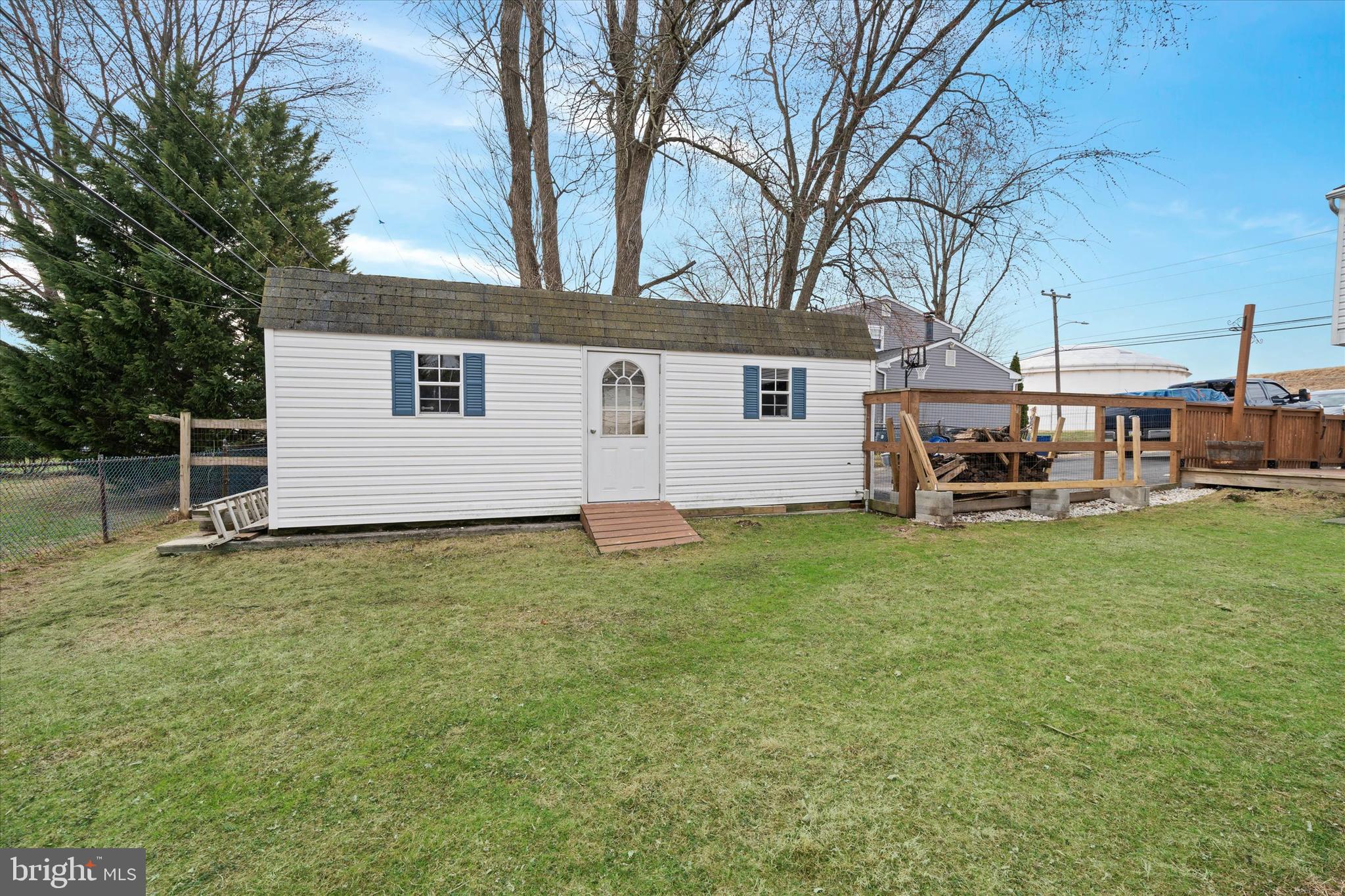1331 Cherry Tree Road Aston, PA 19014 - Photo 34 of 40 a backyard of a house with table and chairs