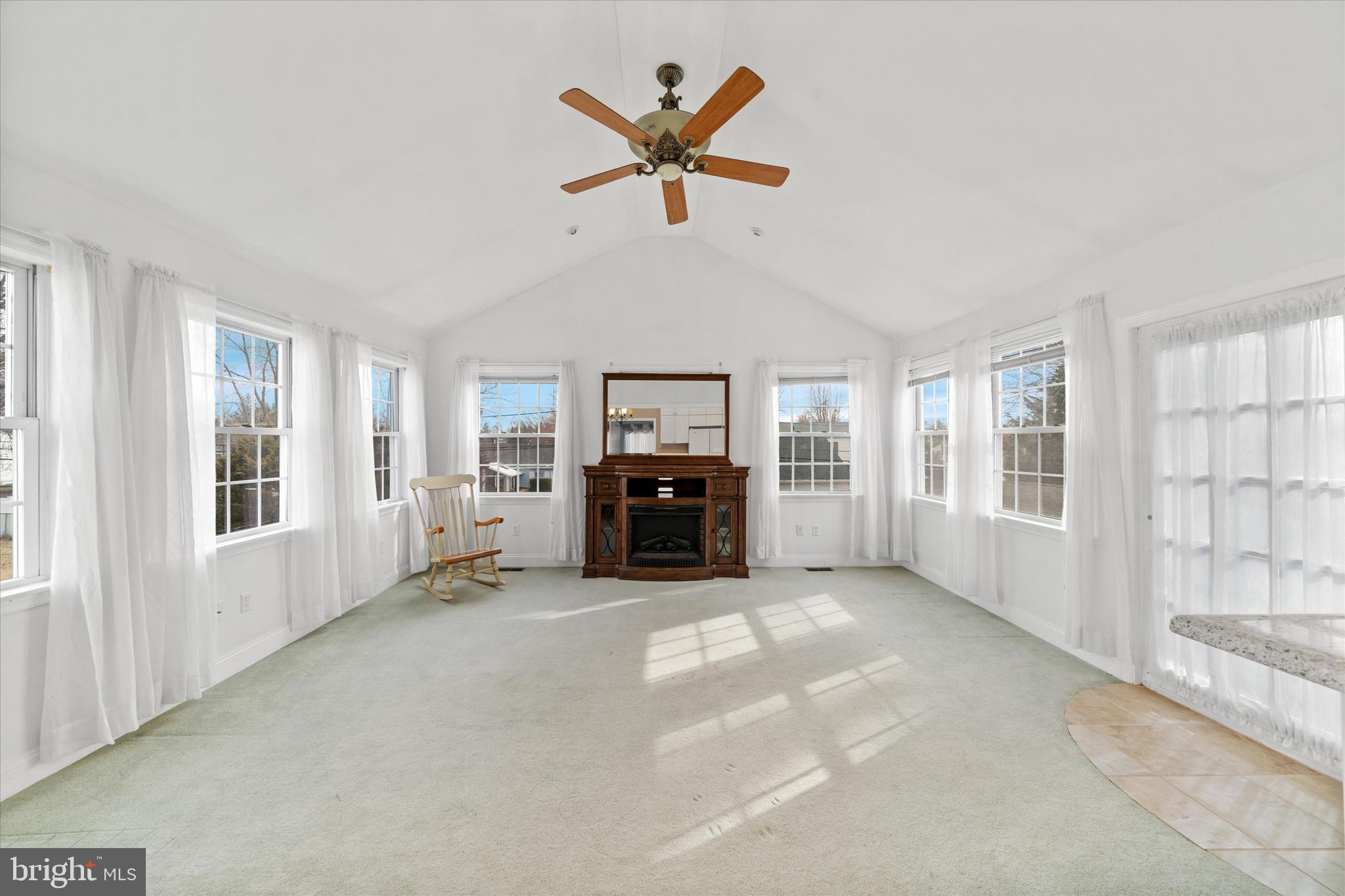 1331 Cherry Tree Road Aston, PA 19014 - Photo 5 of 40 a living room with furniture and a large window with kitchen view