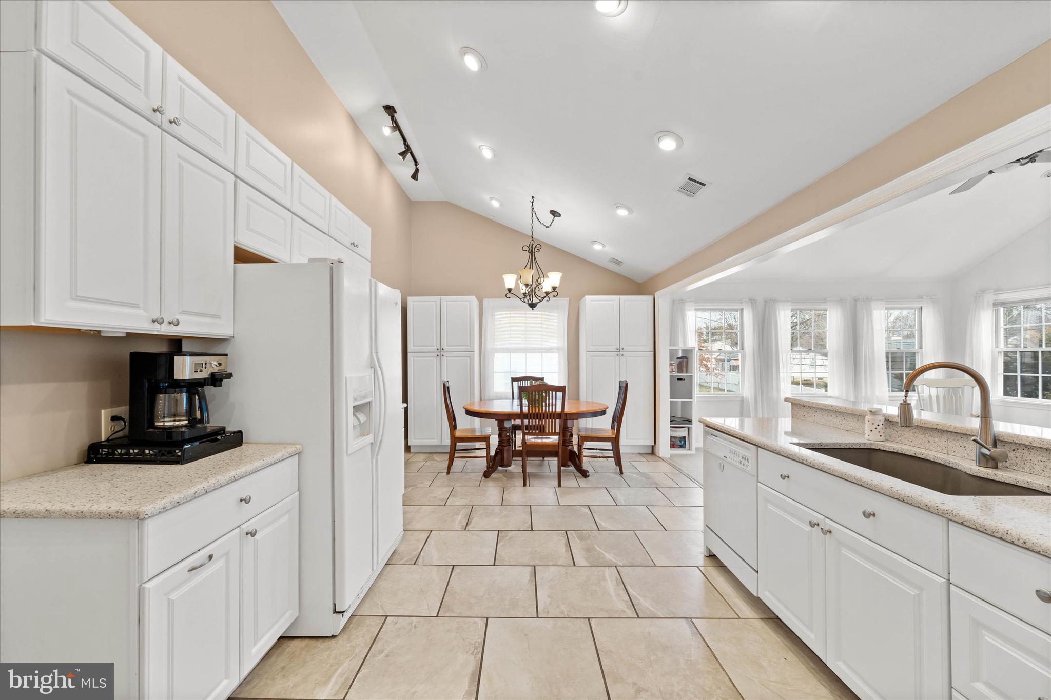 1331 Cherry Tree Road Aston, PA 19014 - Photo 7 of 40 a kitchen with stainless steel appliances granite countertop a sink and cabinets