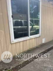 3612 Northeast 4th Street, Unit 18 Renton, WA 98056 - Photo 15 of 16 a view of a door and a chair