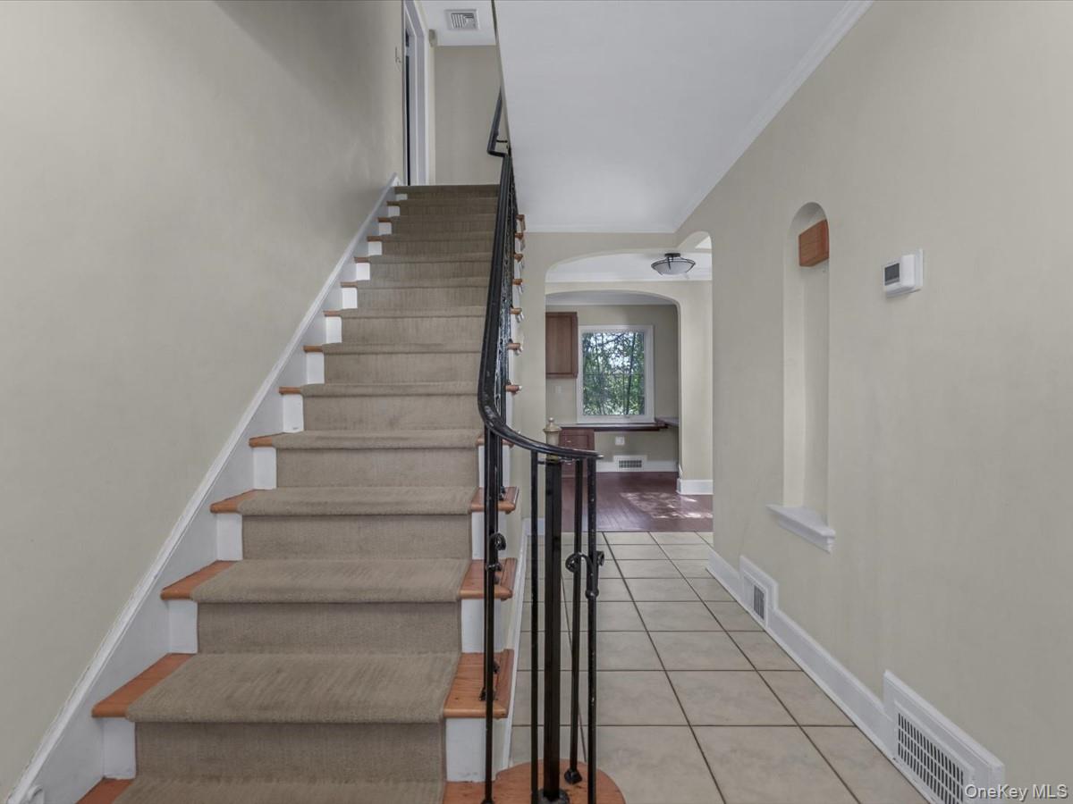 2 Amherst Road Great Neck, NY 11021 - Photo 3 of 45 a view of entryway and hall with wooden floor