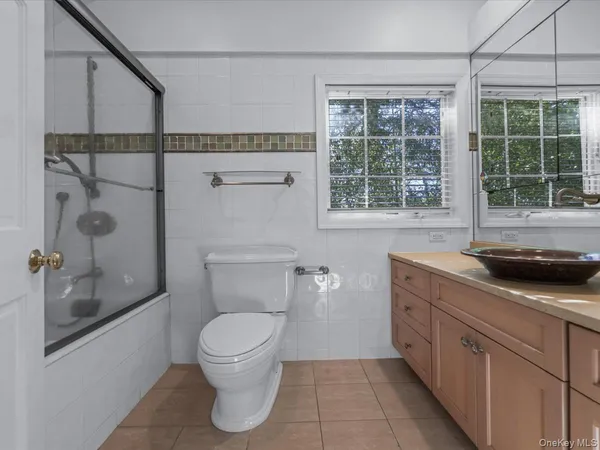 a bathroom with a toilet a sink and a bathtub