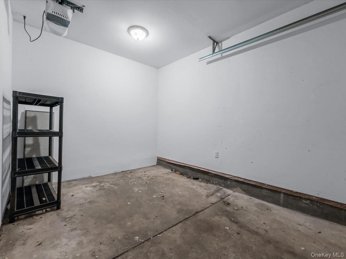 2 Amherst Road Great Neck, NY 11021 - Photo 39 of 45 a view of a room with rack on the wall