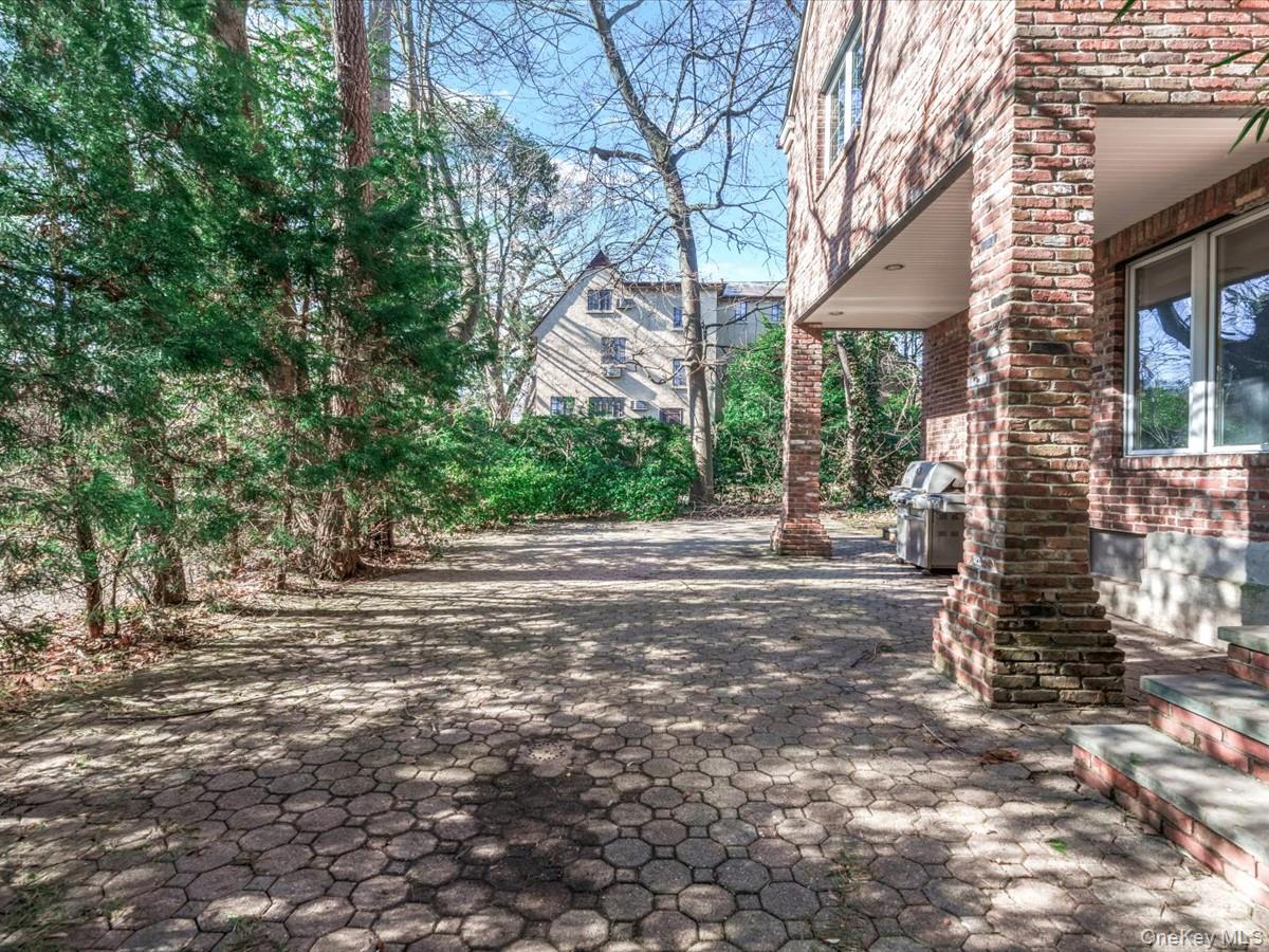2 Amherst Road Great Neck, NY 11021 - Photo 40 of 45 a view of road and trees