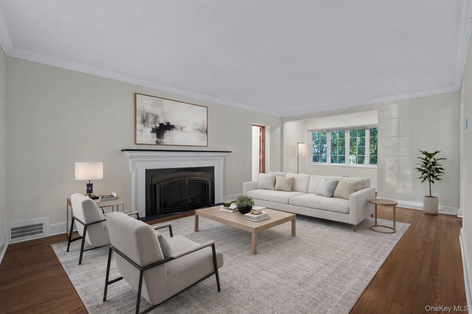 2 Amherst Road Great Neck, NY 11021 - Photo 5 of 45 a living room with furniture and a fireplace