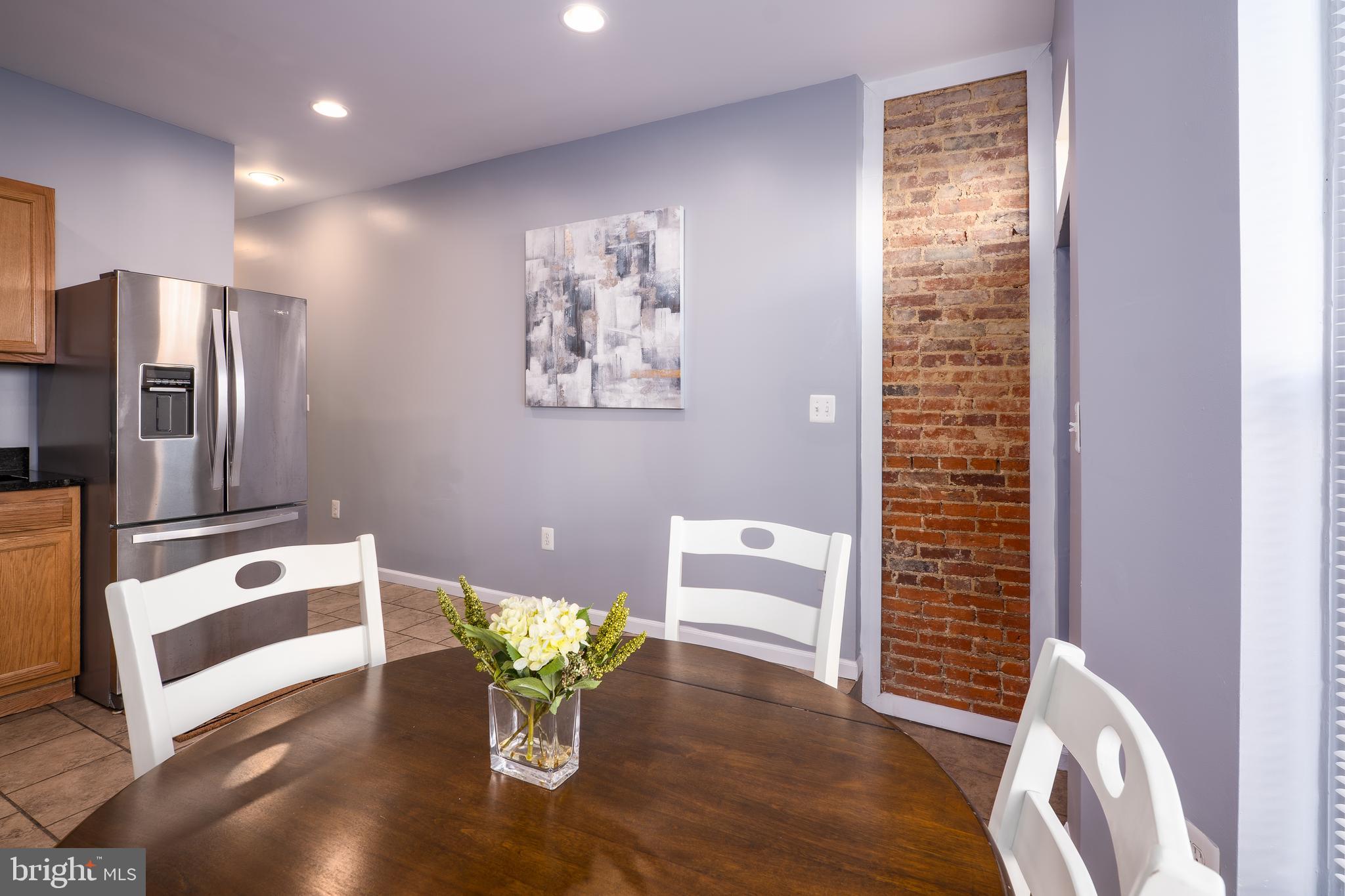 1247 Carroll Street Baltimore, MD 21230 - Photo 21 of 24 a dining room with furniture and window