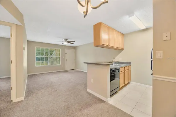 a view of a room with a flat screen tv