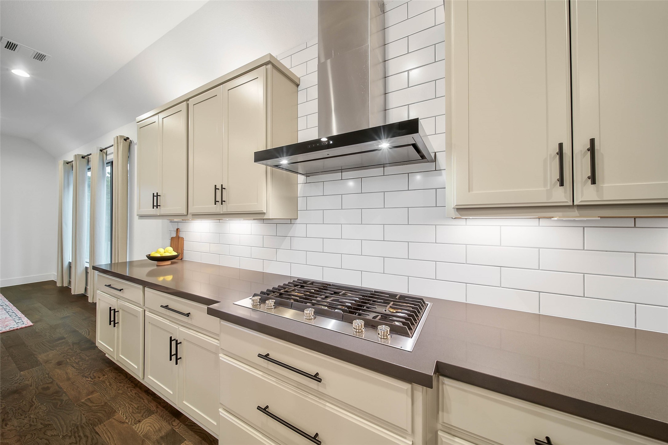 1015 Oak Briar Lane Conroe, TX 77384 - Photo 19 of 50 a kitchen with stainless steel appliances a stove and a refrigerator
