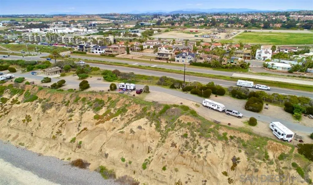 6512 Surfside Lane Carlsbad, CA 92011 - Photo 4 of 26 a view of a city with an ocean view