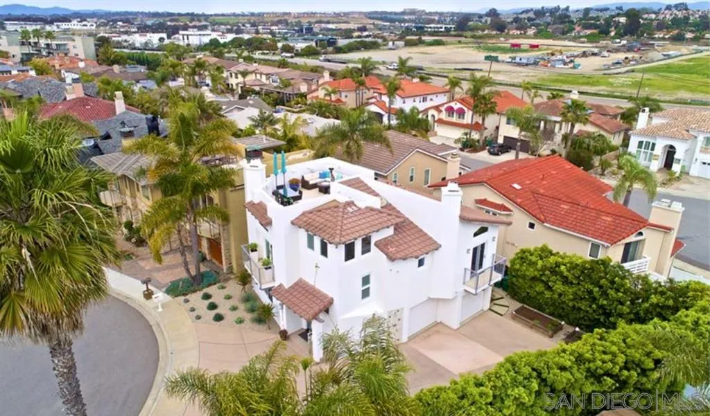 6512 Surfside Lane Carlsbad, CA 92011 - Photo 5 of 26 an aerial view of residential houses with outdoor space
