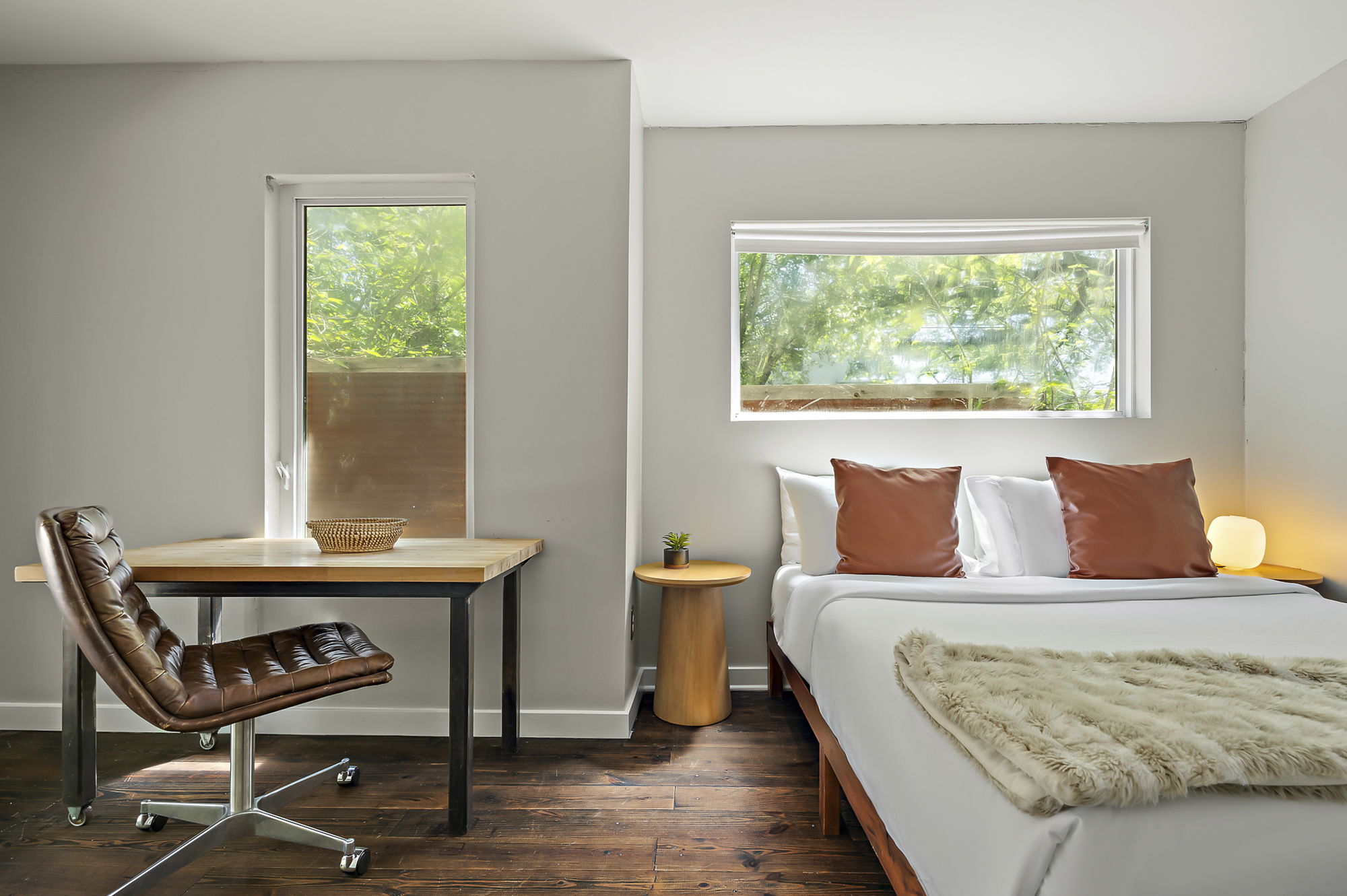 1211 Alexander Avenue Austin, TX 78702 - Photo 20 of 34 a bed sitting in a bedroom next to a window