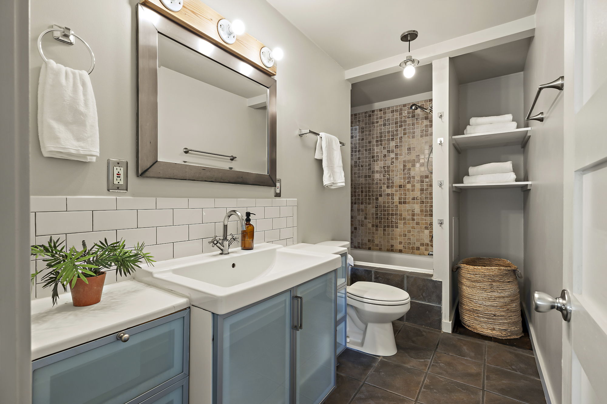 1211 Alexander Avenue Austin, TX 78702 - Photo 21 of 34 a bathroom with a sink toilet and shower