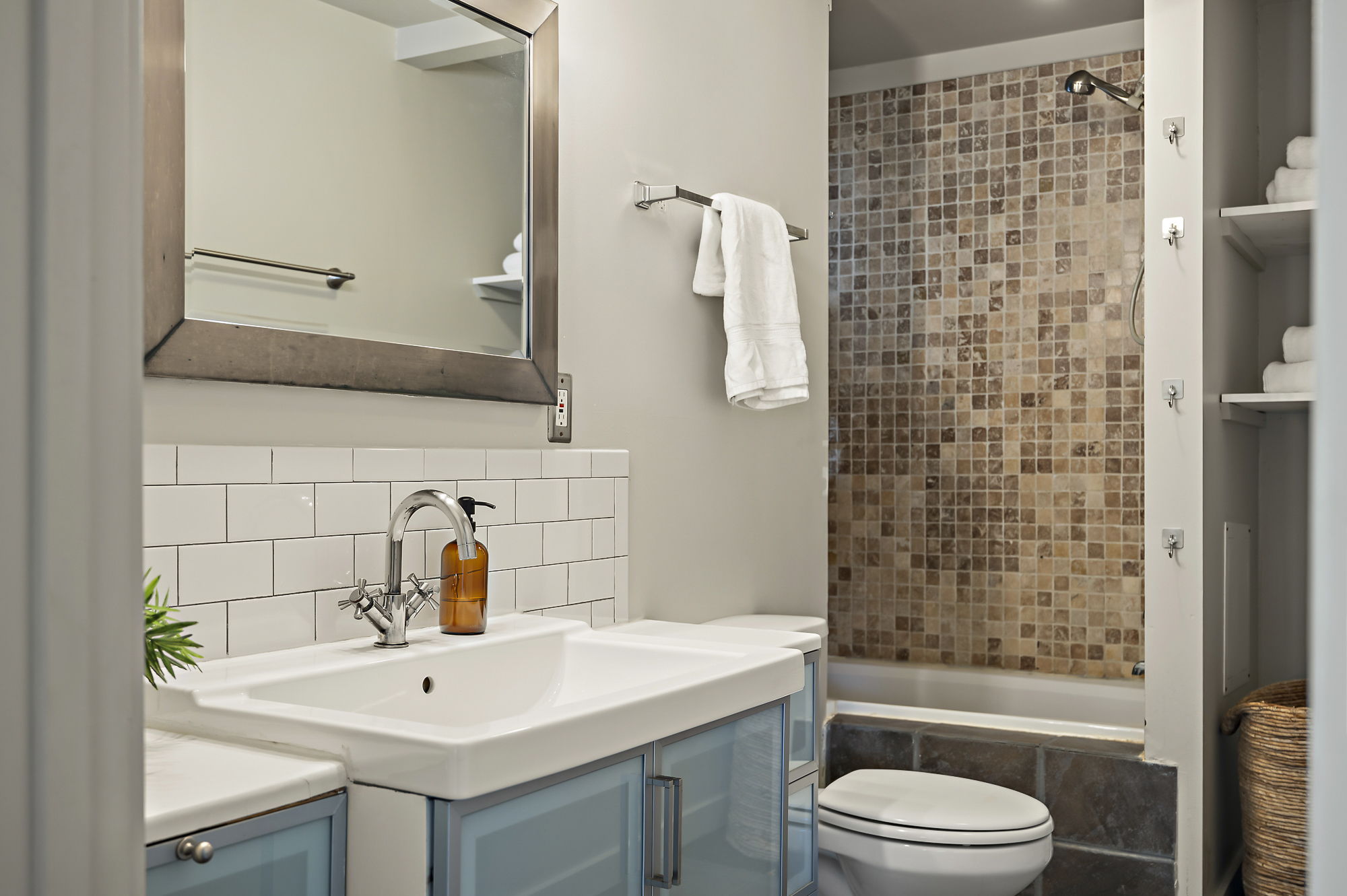 1211 Alexander Avenue Austin, TX 78702 - Photo 23 of 34 a bathroom with a sink a toilet and shower