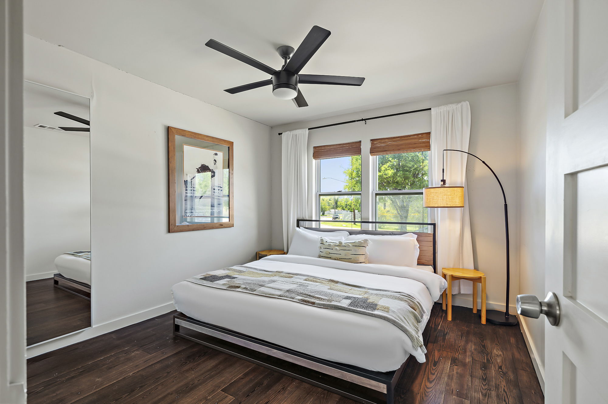 1211 Alexander Avenue Austin, TX 78702 - Photo 24 of 34 a bedroom with a large bed and a window