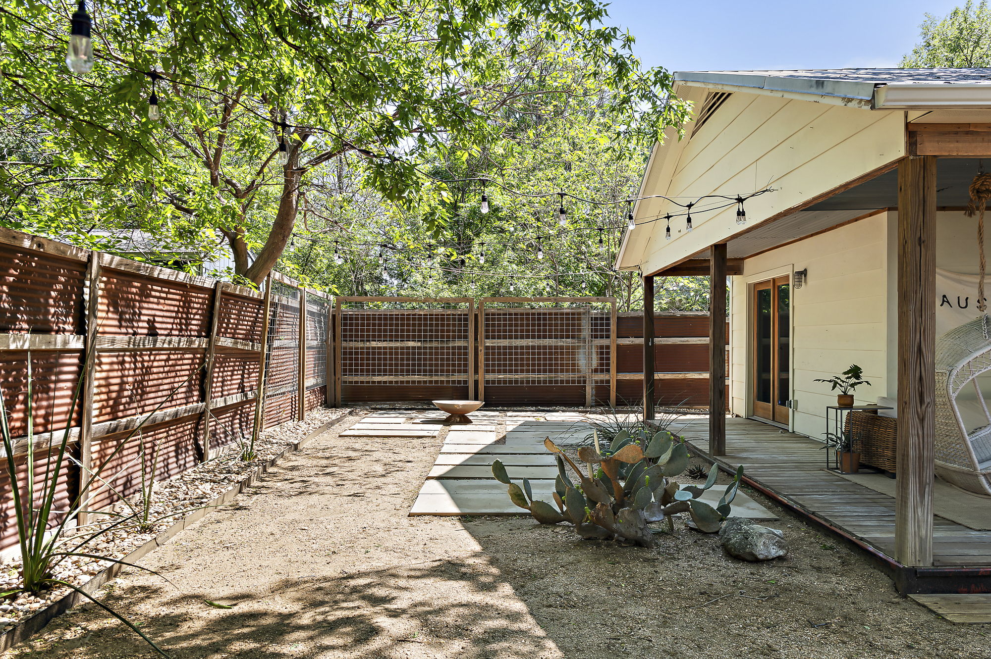1211 Alexander Avenue Austin, TX 78702 - Photo 27 of 34 a view of backyard with trees