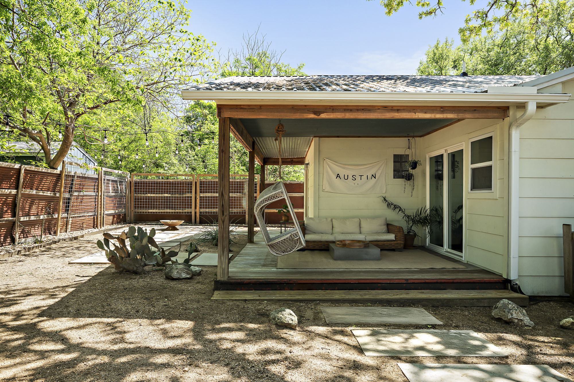 1211 Alexander Avenue Austin, TX 78702 - Photo 29 of 34 a view of a chair and table in backyard of the house