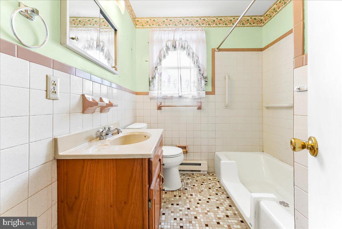 374 Street Road Cochranville, PA 19330 - Photo 16 of 28 a bathroom with a sink toilet and shower