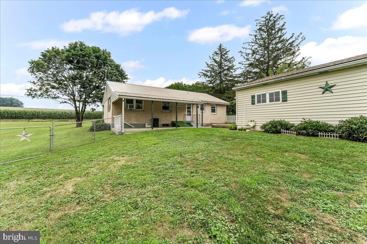 374 Street Road Cochranville, PA 19330 - Photo 23 of 28 a view of a house with backyard and garden