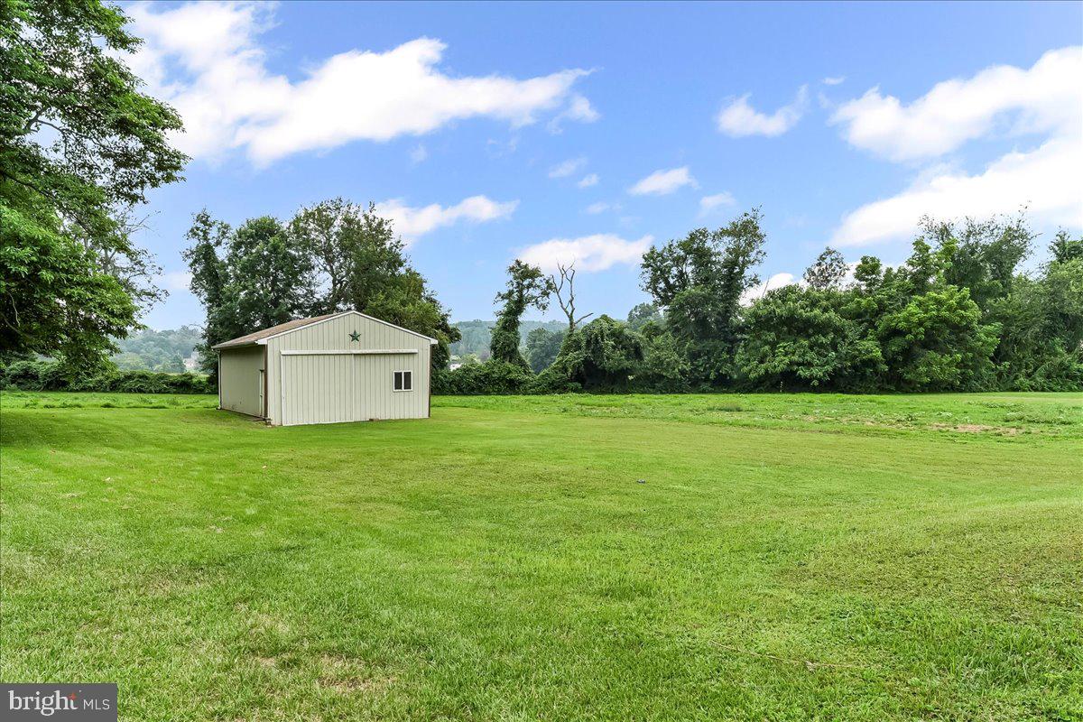 374 Street Road Cochranville, PA 19330 - Photo 25 of 28 a fire hydrant in the middle of a field
