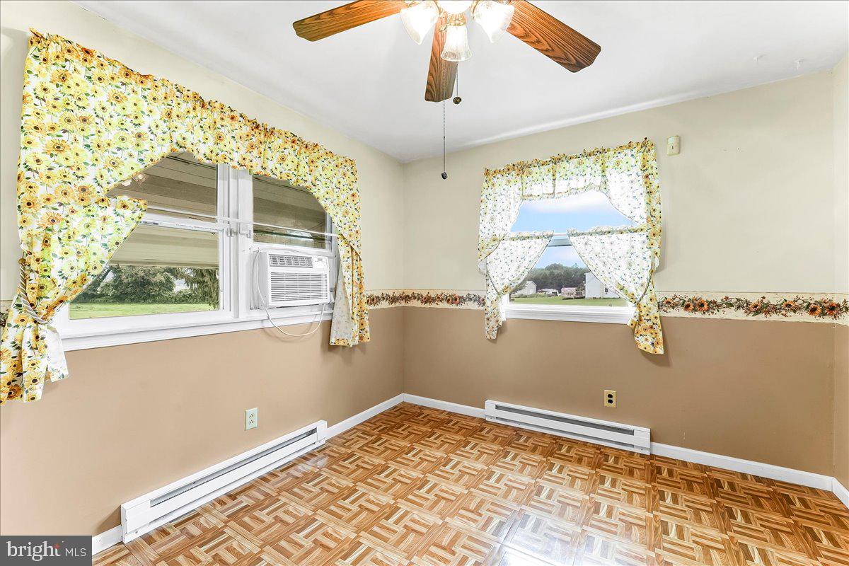 374 Street Road Cochranville, PA 19330 - Photo 8 of 28 a view of a bedroom with window