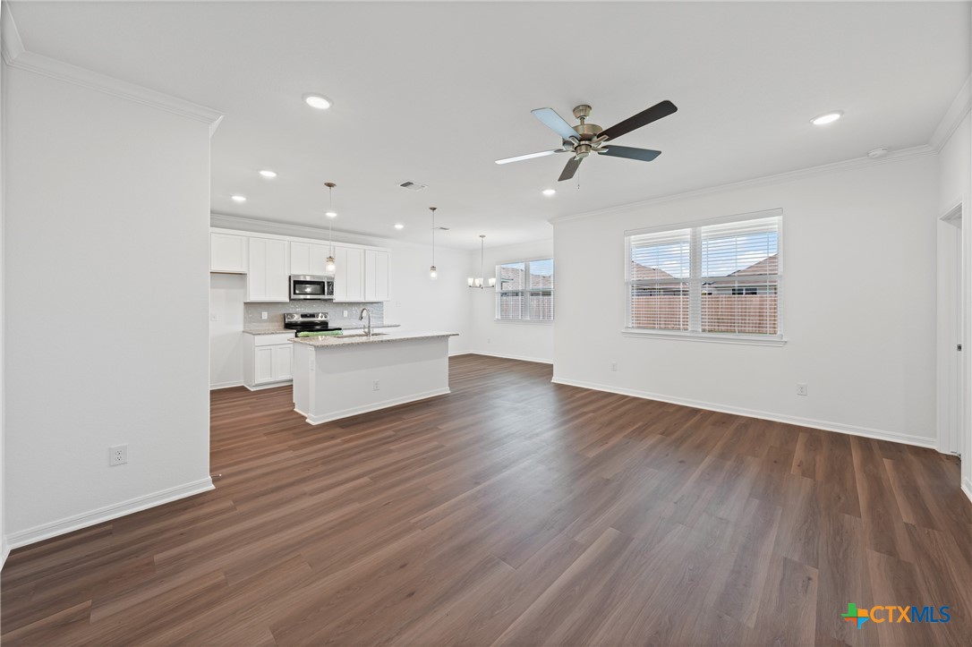 7906 Timber Holw Lane Temple, TX 76502 - Photo 12 of 29 a view of a kitchen with wooden floor and a kitchen