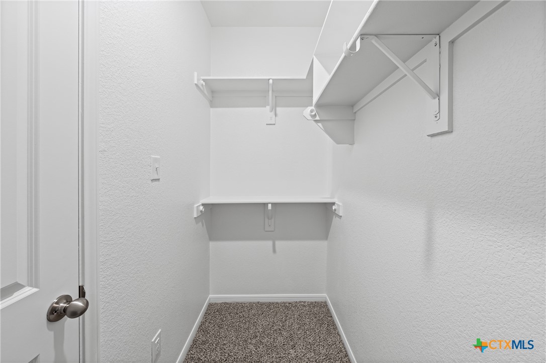 7906 Timber Holw Lane Temple, TX 76502 - Photo 27 of 29 a view of an empty walk in closet