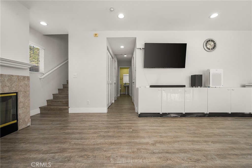 418 East Olive Avenue, Unit B Monrovia, CA 91016 - Photo 15 of 41 a view of a livingroom with an empty space and a kitchen