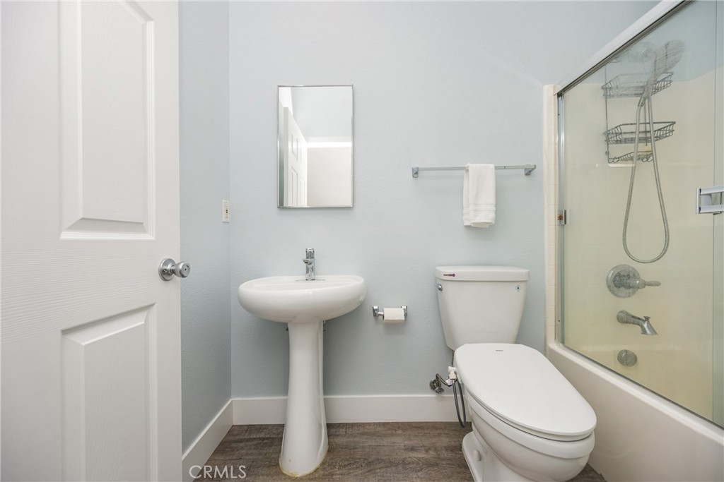 418 East Olive Avenue, Unit B Monrovia, CA 91016 - Photo 25 of 40 a bathroom with a sink toilet and shower
