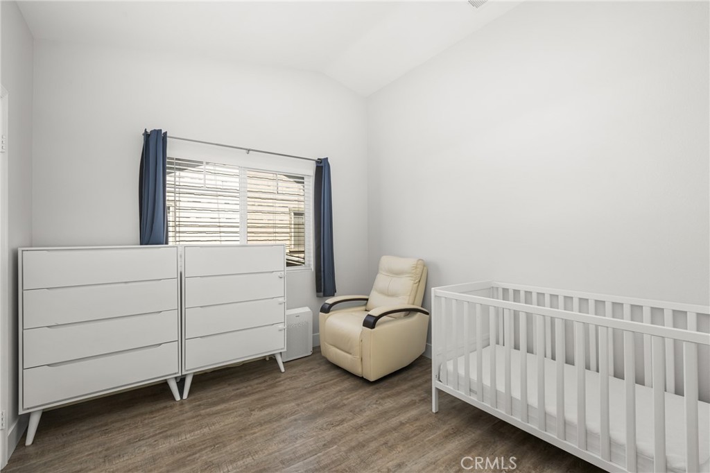 418 East Olive Avenue, Unit B Monrovia, CA 91016 - Photo 25 of 41 a bedroom with a bed and a window