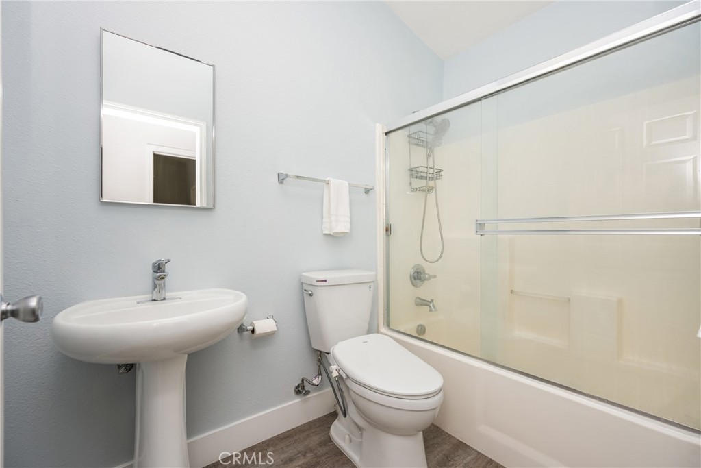 418 East Olive Avenue, Unit B Monrovia, CA 91016 - Photo 26 of 40 a bathroom with a sink toilet and shower