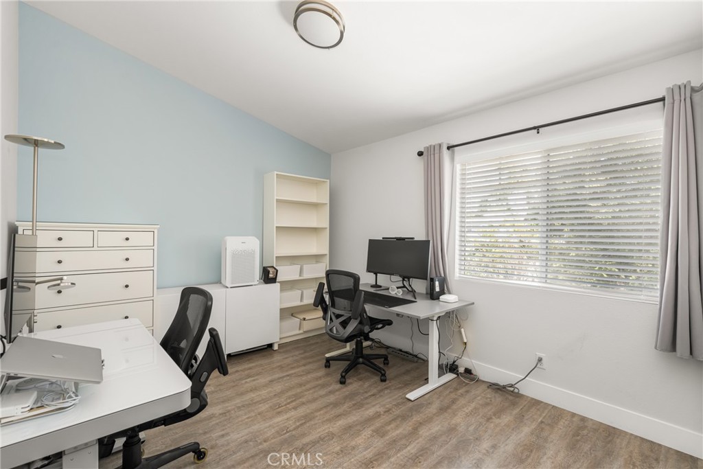 418 East Olive Avenue, Unit B Monrovia, CA 91016 - Photo 28 of 40 a view of a workspace with furniture and a window