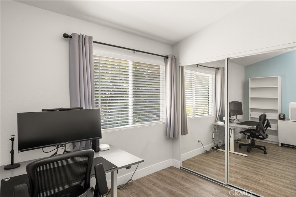 418 East Olive Avenue, Unit B Monrovia, CA 91016 - Photo 29 of 40 a view of a workspace with furniture and a window