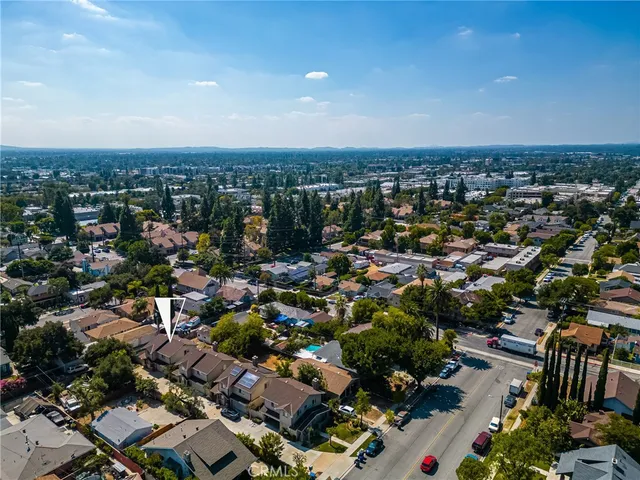 an aerial view of a city with lots of residential buildings