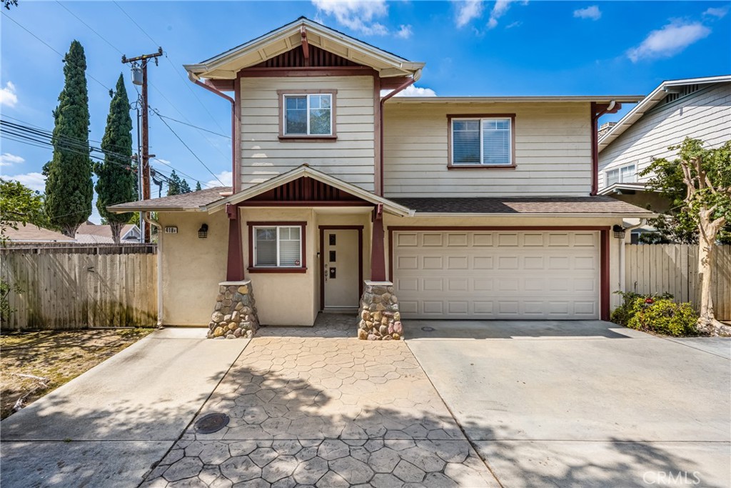 418 East Olive Avenue, Unit B Monrovia, CA 91016 - Photo 41 of 41 a front view of a house with a yard and garage