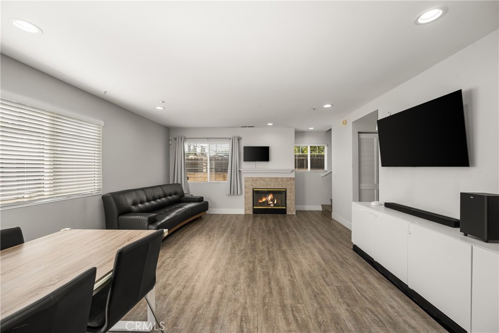 418 East Olive Avenue, Unit B Monrovia, CA 91016 - Photo 6 of 41 a living room with furniture and a flat screen tv