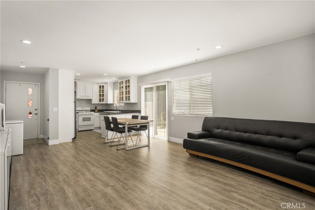 418 East Olive Avenue, Unit B Monrovia, CA 91016 - Photo 8 of 41 a living room with furniture and kitchen view