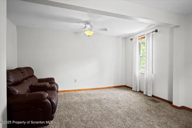 a room with furniture and a window