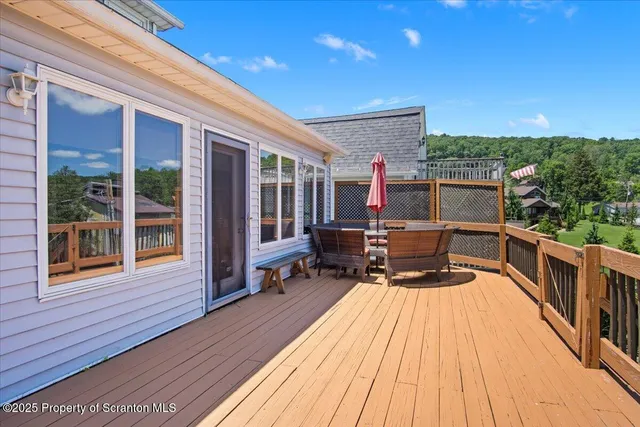 a view of roof deck with a barbeque