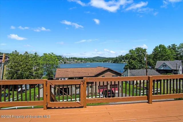 a view of a chairs and table in a yard